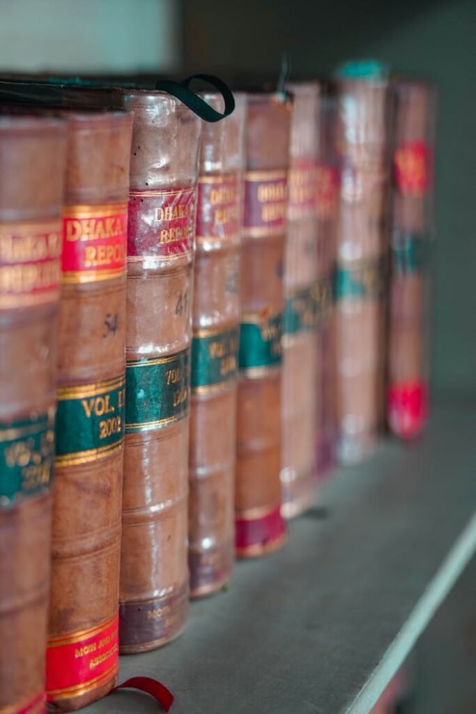 Piled Books on a Shelf